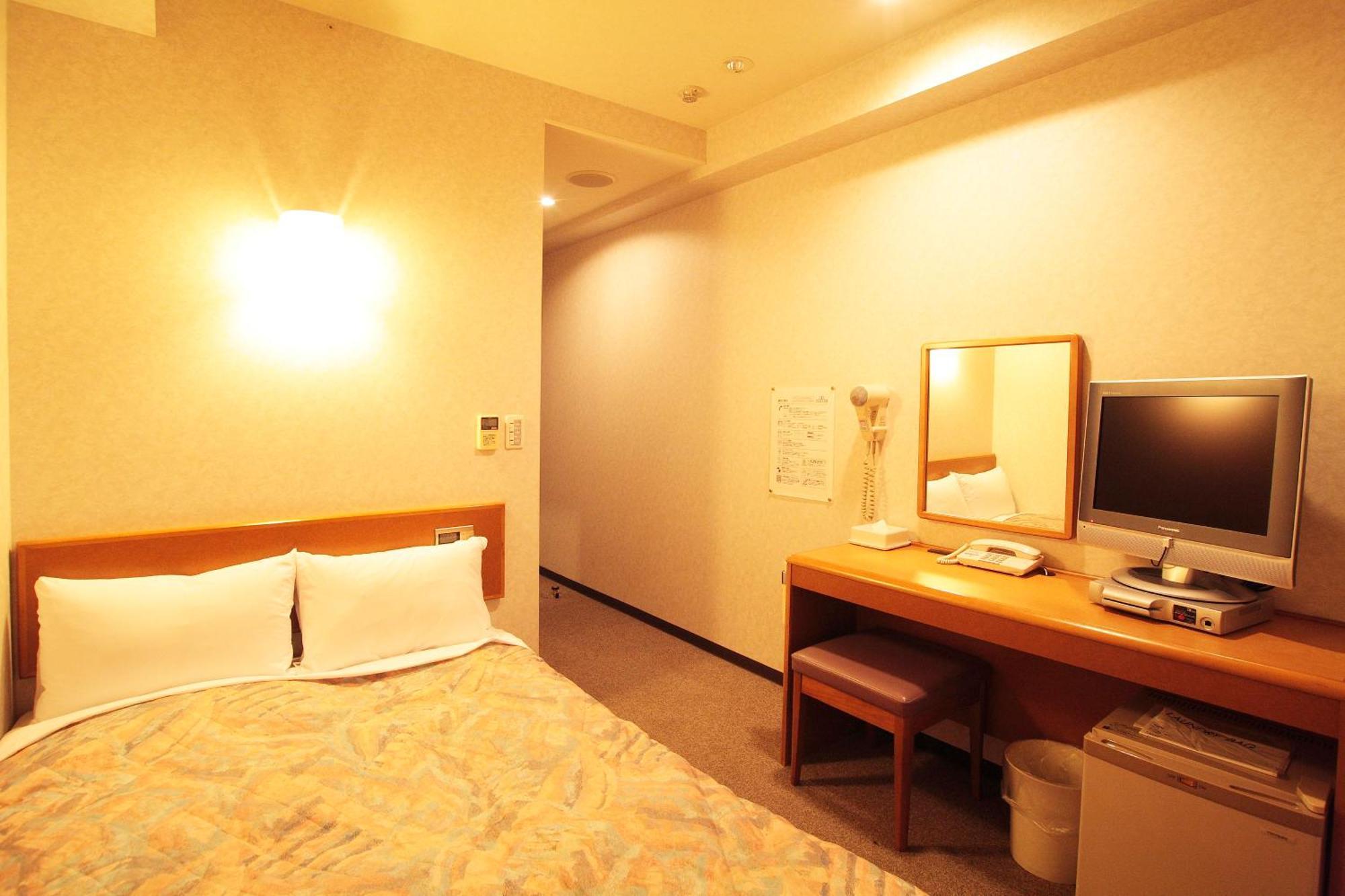Hotel New Budget Sapporo Rom bilde
